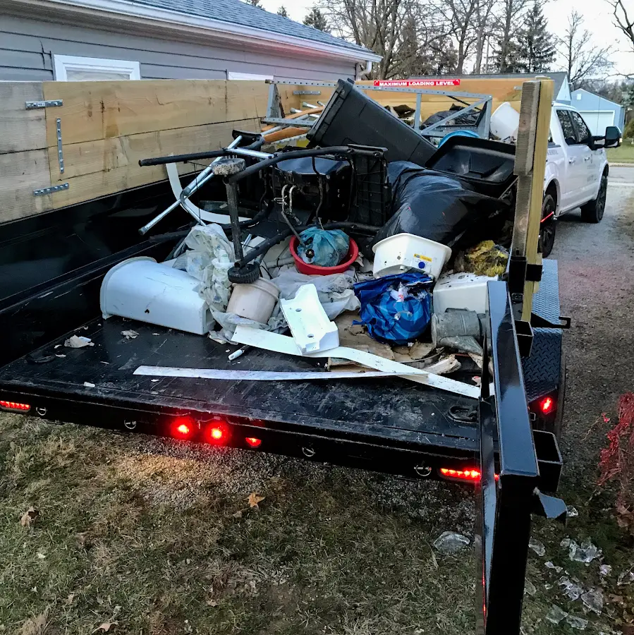 Roll-off dumpster delivered to a residential driveway in Lake Helen
